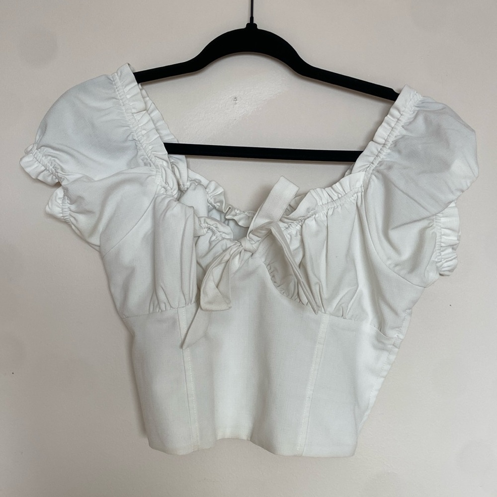 Little Moss white, ruffle crop top with side zipper. Size small.